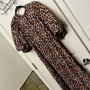 Maxi dress Size M from H&M both sides are open with puffy Sleeves.
